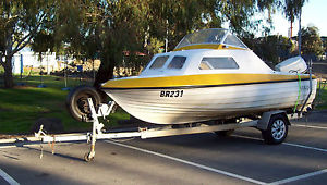 Half cab boat, 85hp outboard, gal trailer, fish finder + more. (Small project)
