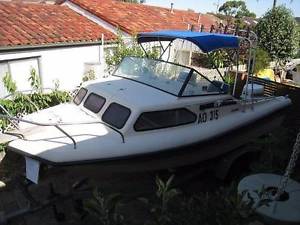 18” (5.6 metres) Swift Craft Explorer Half-cabin Boat - 1986