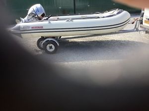 12 ft infllatable rib engine and trailor