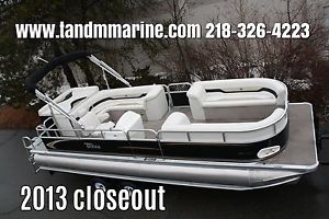 New 24 ft pontoon boat with 150 four stroke and trailer