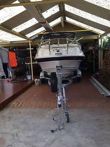 2004 model fiberglass half cabin boat with lots of extras