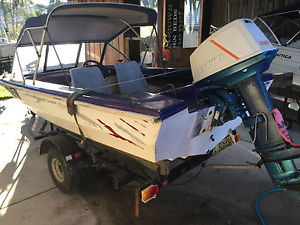 4.2M Fiberglass and Trailer with 40HP Suzuki all rego needs work selling cheap.