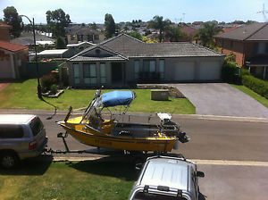 5M EXPRESS CUDDY CAB POWERED BY A YAMAHA FOUR STROKE 60hp with low hours