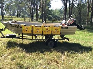 Aluminium tinny boat with trailer