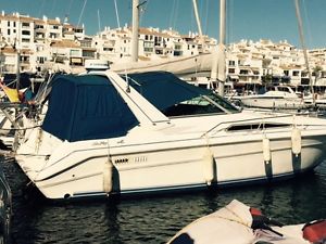 Sea Ray 330 Sundancer,white and blue cruiser boat