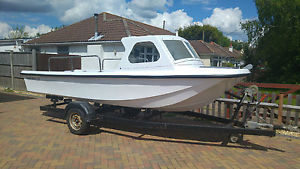 TASKFORCE 18 FISHING/DIVE/PLEASURE BOAT/BRAKED TRAILER/35 HP EVINRUDE OUTBOARD