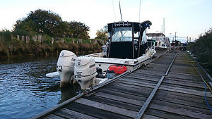 24/25ft SPORTS FISHING AND WAKEBOARDING CUDDY BOAT VERY VERY FAST ON TRAILER