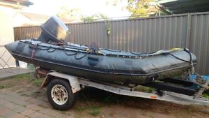 Ex army Zodiac with 50hp Yamaha and trailer.