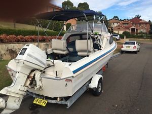 Swiftcraft half cabin boat
