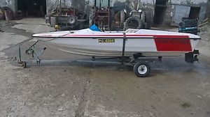 speedboat in need of some tlc. Fletcher boat. Mercury engine.