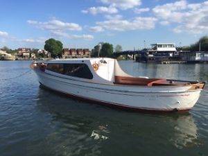 Sulair, an elegant refurbished wooden motor cruiser
