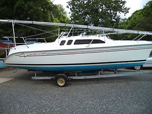 Legend 240 Sailing boat damaged repairable complete with galvanised trailor.