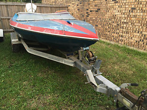 5.5M Bullet speed boat with trailer needs work but has great Potential.