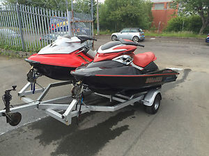 2 Seadoo jet skis and Double Trailer