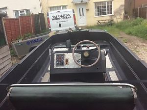 Sea skater dory with 40hp mariner and roller trailer
