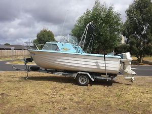 5.2m Fibreglass Boat with Johnson 100 Outboard Motor