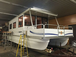 1999 little hobo 10x34 catamaran cruiser