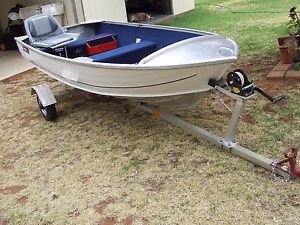 tinny on fold-up trailer