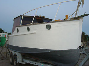 Wooden boat 23' vintage Kauri pine river cruiser, floating project.