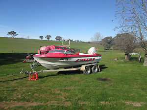 16 foot ski/fishing boat 140hp outboard motor and gal tandem trailer