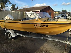 fibreglass boat and trailer with rego