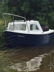 Boat & Trailer with Mercury Outboard