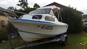 4.8m fiberglass 65hp with trailer