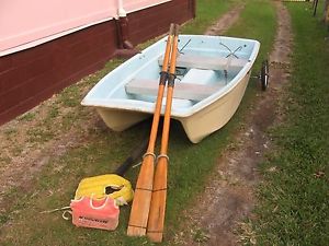 small fibreglass boat, dinghy,