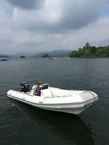 2009 SEAPRO 560 RIB Mercury 75 Optimax Engine and Indespension Roller Trailer
