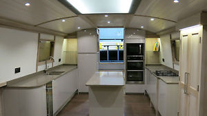 wide beam barge 60ft by 12ft. contemporary design.Live-a-board.