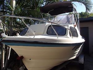 Bermuda fiberglass 15' Boat. 1/2 cabin, 90hp engine, trailer and current regos