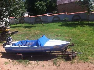 5.1 m long ALUMINUM BOAT POWERED by a 65 HP Mercury MOTOR, with VOLVO gearbox