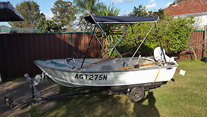 11ft boat with 9.9 Evinrude outboard