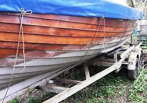 CLINKER BUILT WOODEN RIVER BOAT WITH TRAILER