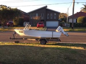 Boat and trailer, both with long rego