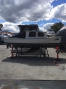 Timber half cabin boat