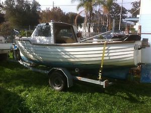 Vintage half cabin boat