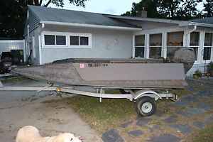 SHELLINGER 12 ft..HIGH DUCK HUNTING BOAT W/ 25hp. JET 4 STROKE