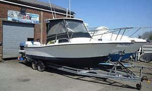 24/25ft SPORTS FISHING AND WAKEBOARDING CUDDY BOAT ON TRAILER, VERY FAST