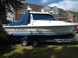 QUICKSILVER 650 WEEKENDER BOAT, ROLLER COASTER TRIALER & MARINER 100HP ENGINE