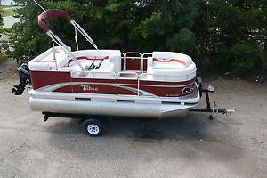 New 16 ft by 7 Pontoon boat with 25 four stroke and trailer