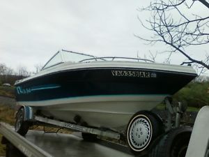 18' boat  sea ray inboard out board 4 cyl merc.
