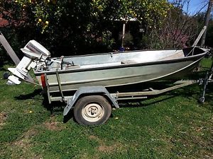11 ft lightweight Brooker alloy boat wth 10 hp Johnson outboard engine & trailer