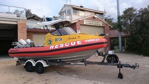 NAIAD 5.8M CUDDY CAB WITH DUAL EVINRUDE 90 ETEC OUTBOARDS