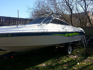 1989 20 ft Searay boat w/ cuddy cabin & trailer