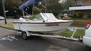 14ft boat with 50hp Johnson outboard motor and trailer (no reg) - Open to offers
