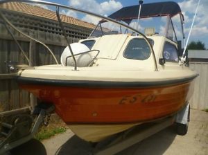 4.7 sportscraft half cab 90 evinrude tilt/trim
