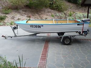3.7 meter savage Snipe with 9.9 Evinrude outboard motor