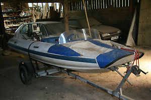 FLATACRAFT  Force 4 rib on trailer with Suzuki 40 oil injection outboard
