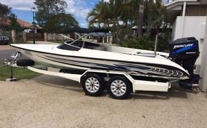 21 foot Ski Boat with 200hp Mercury and tandem axle trailer